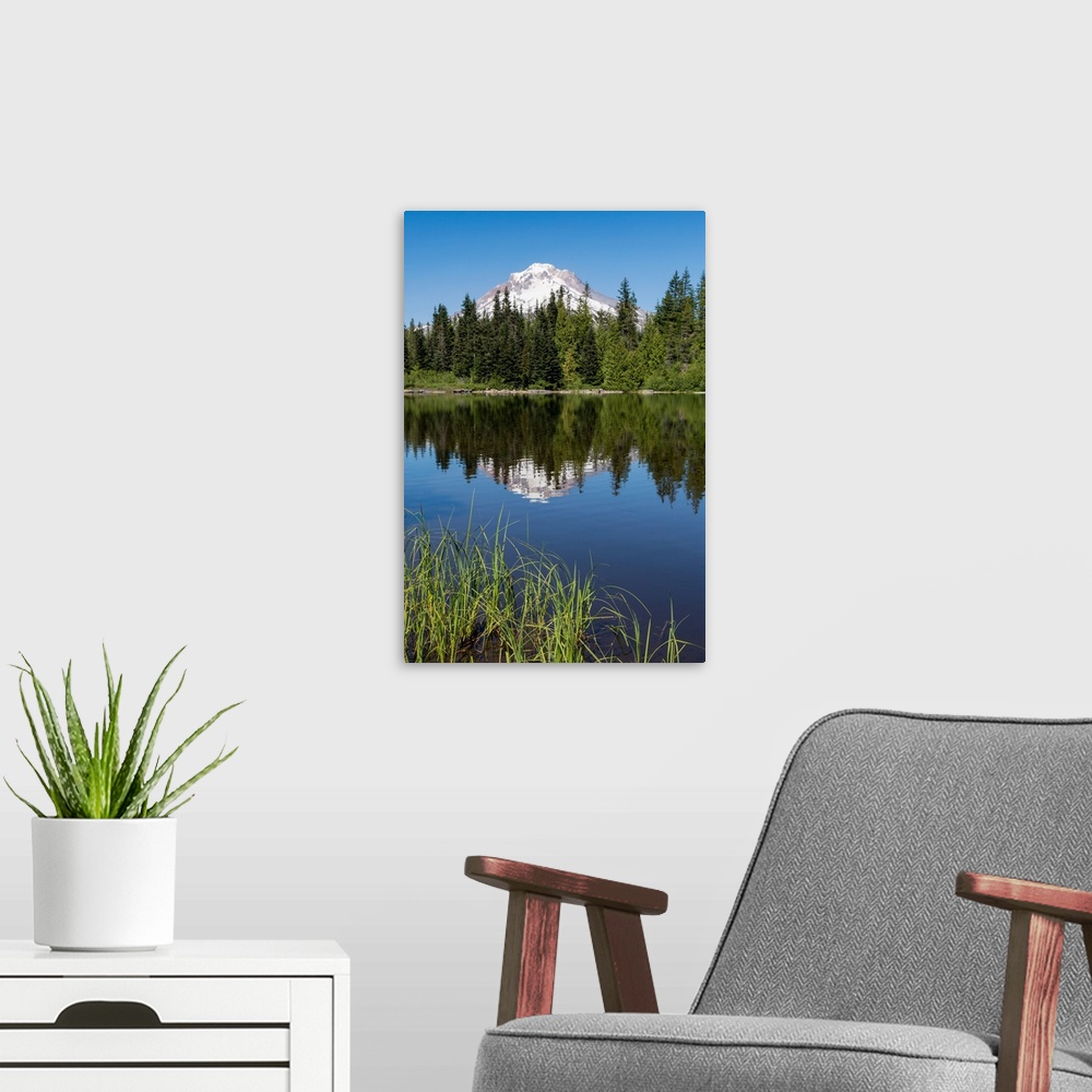 A modern room featuring Mount Hood, part of the Cascade Range, reflected in the still waters of Mirror Lake Northwest reg...