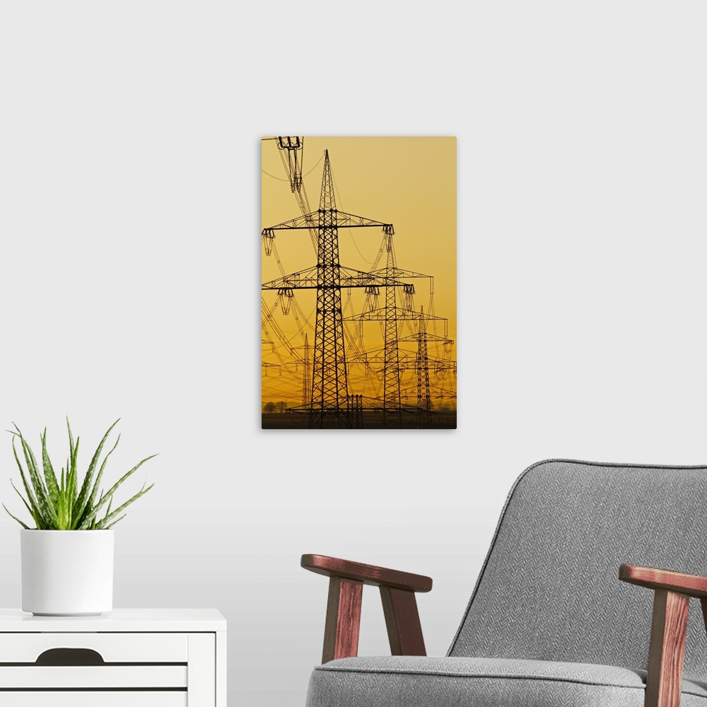 A modern room featuring Power lines in morning light, Germany