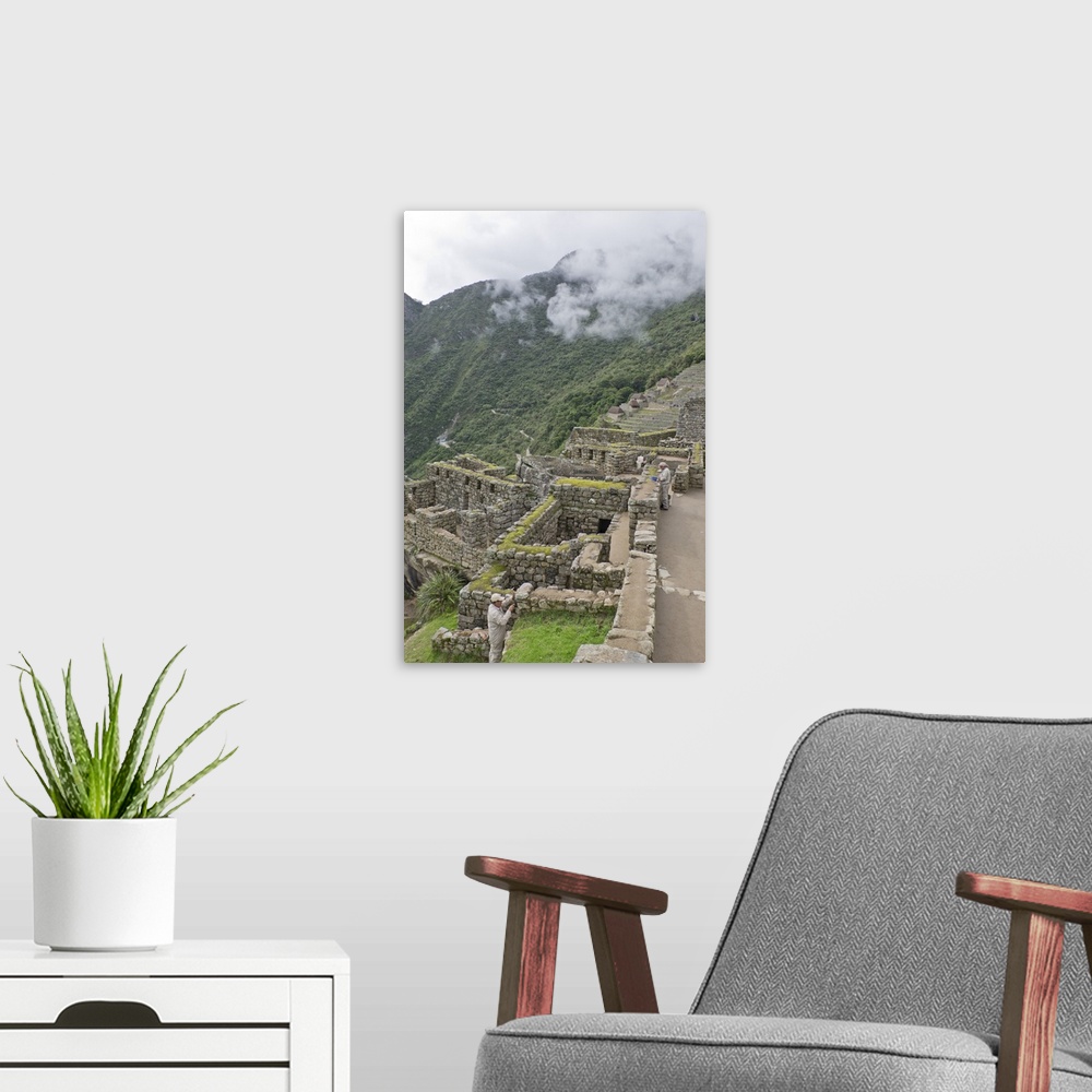 A modern room featuring Restoration work at the Inca ruins of Machu Picchu, Peru