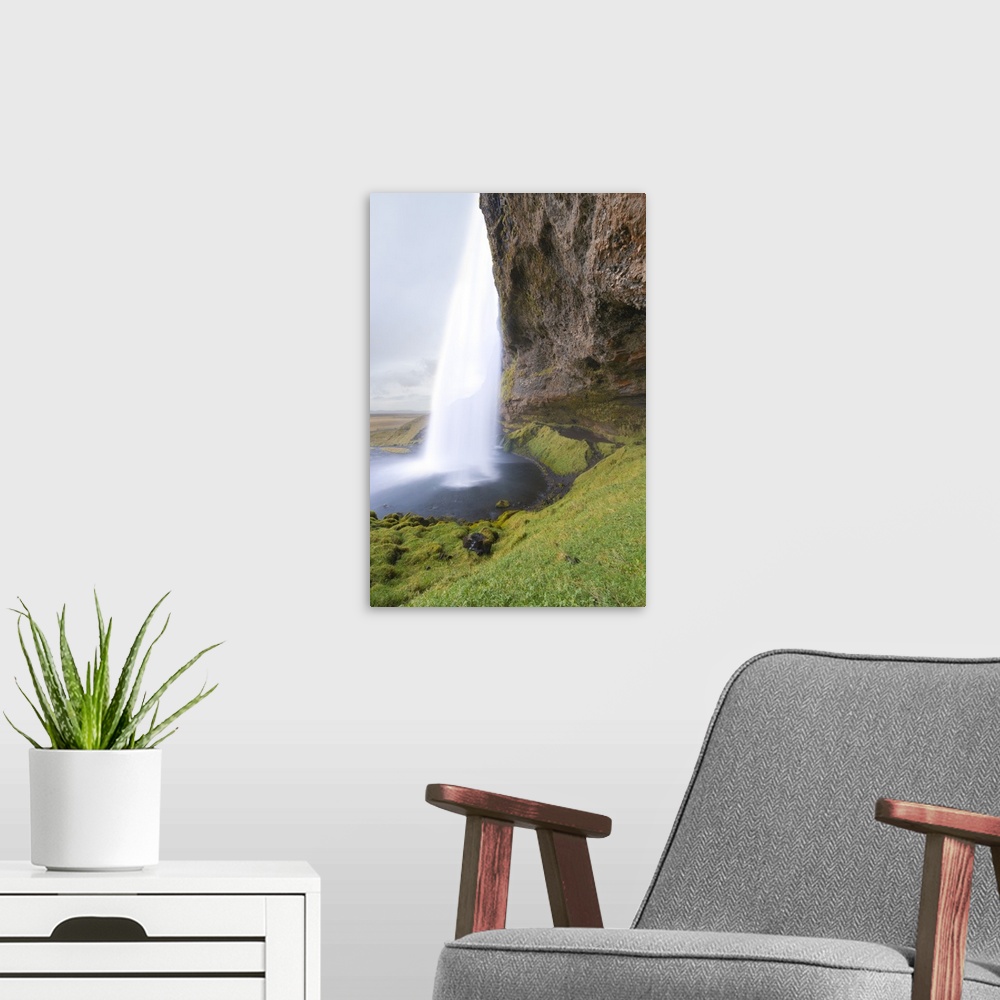 A modern room featuring Seljalandsfoss Waterfall, Iceland, Polar Regions