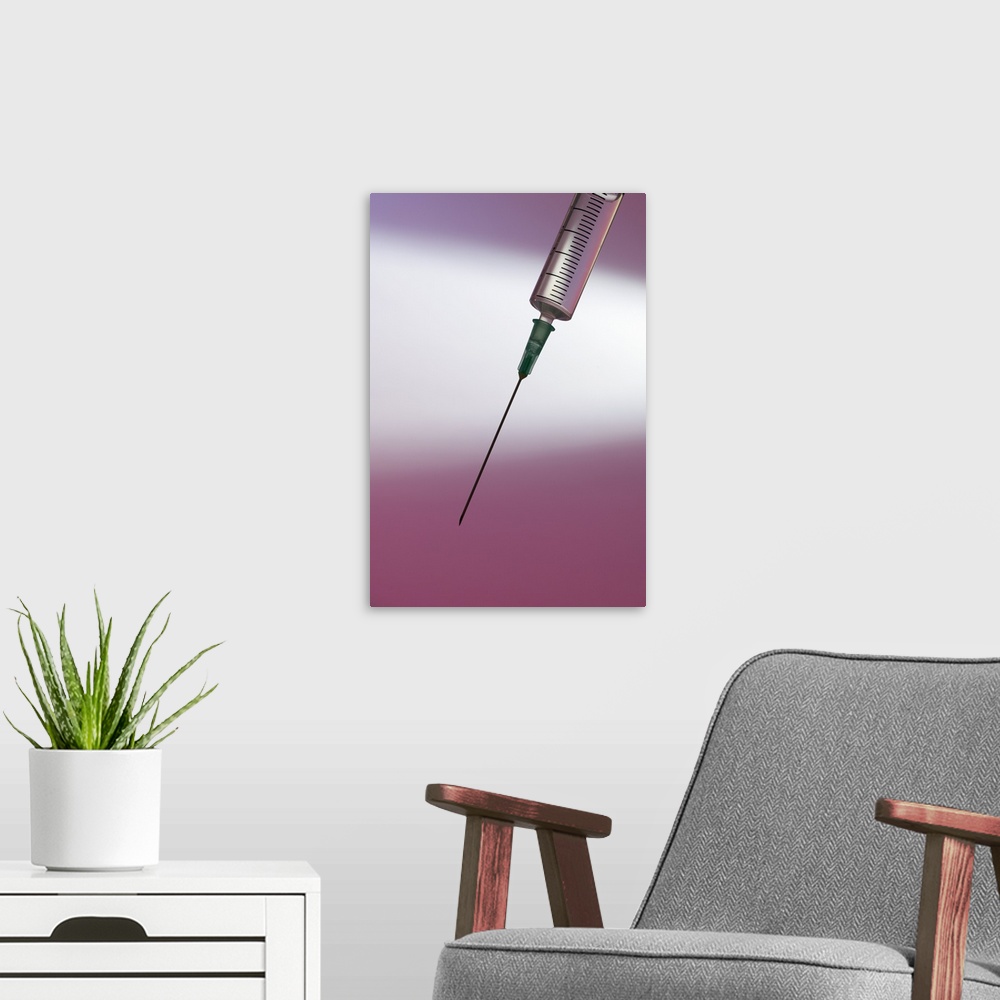A modern room featuring Syringe containing a liquid.