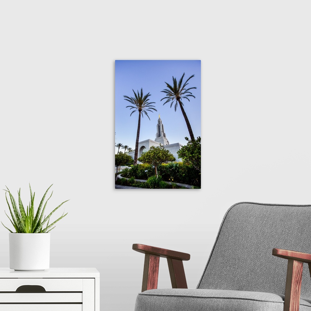 A modern room featuring The Redlands California Temple is the 116th operating temple and is surrounded by palm trees in i...