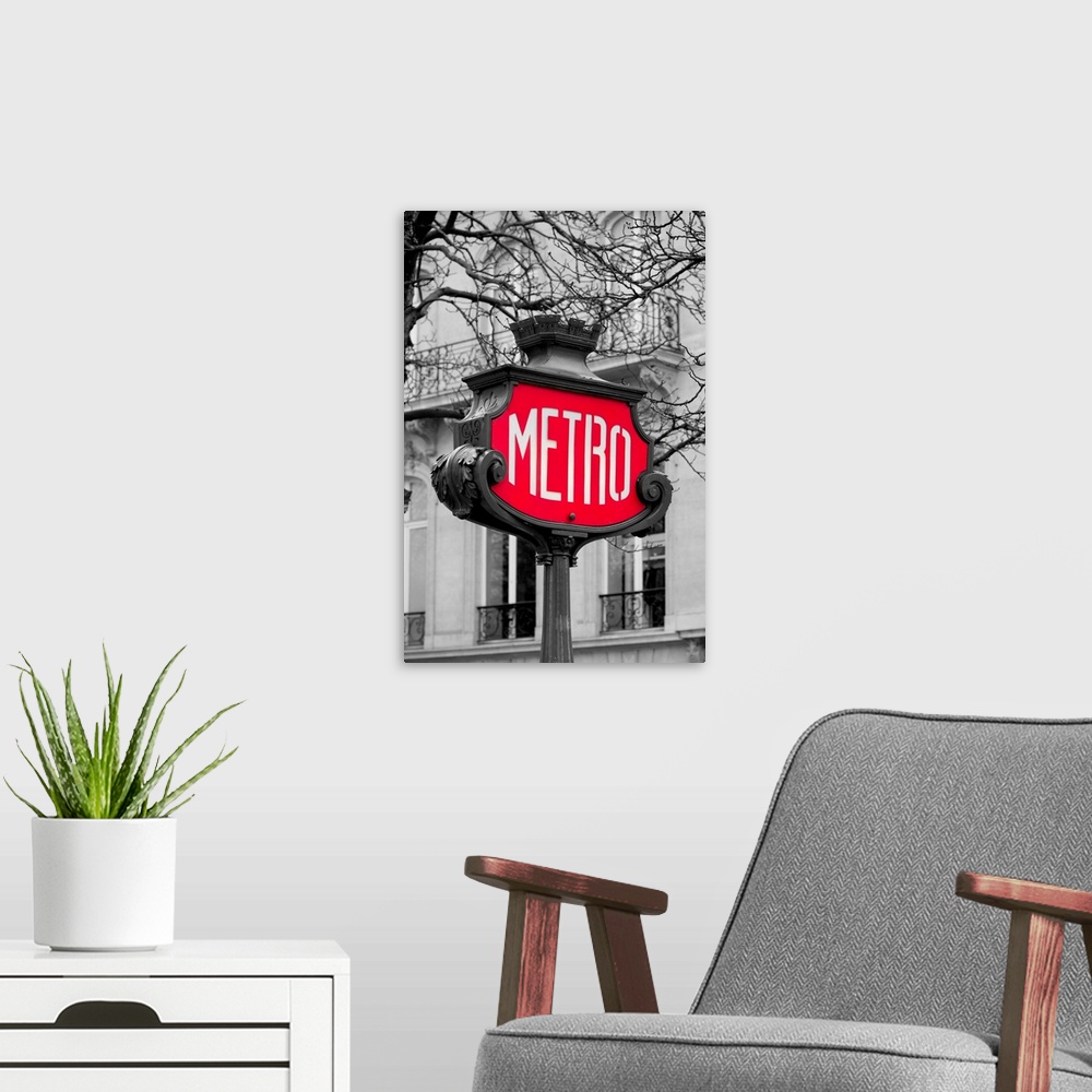 A modern room featuring Metro sign for subway transportation in Paris, France.