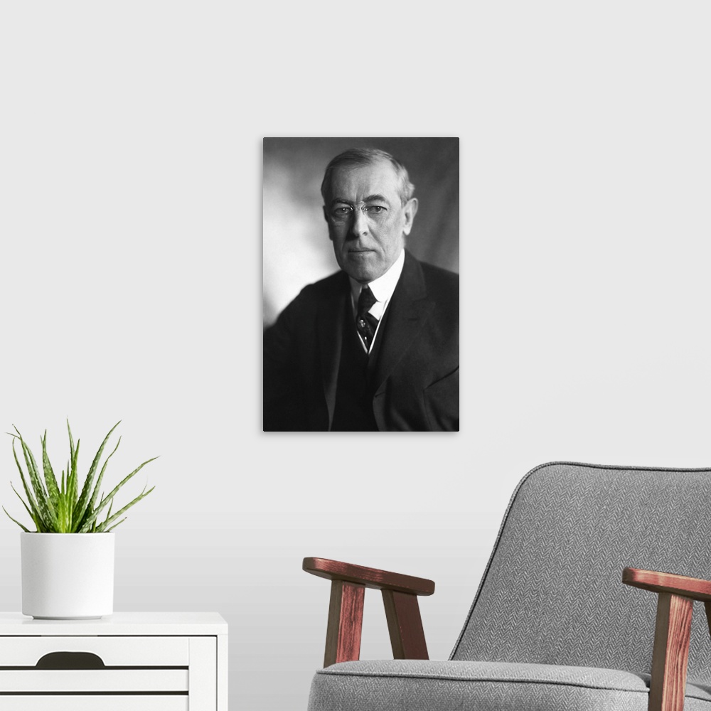 A modern room featuring American history portrait of President Woodrow Wilson.