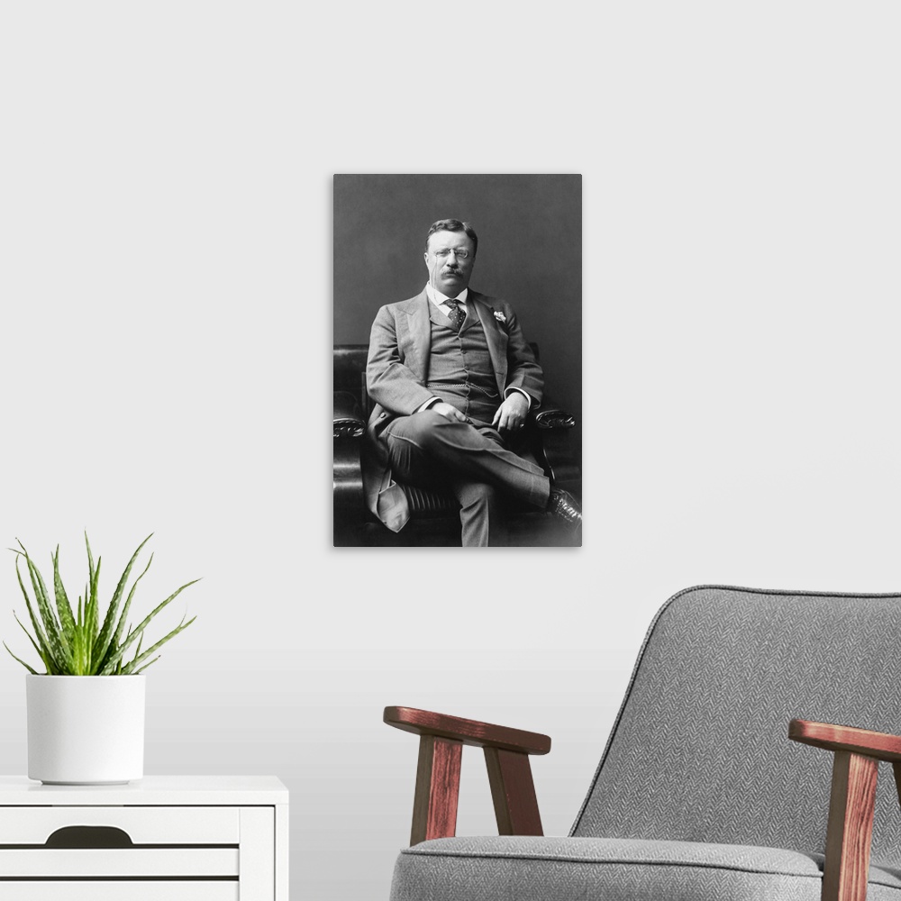 A modern room featuring Presidential history photograph of Theodore Roosevelt, dated 1906.