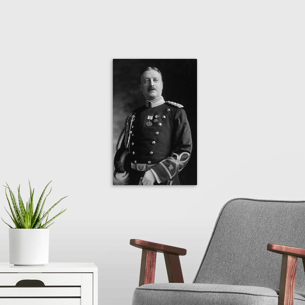 A modern room featuring Vintage portrait of Captain Archibald Butt in his military uniform.