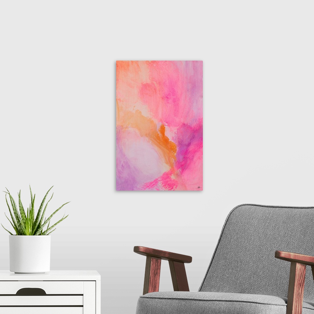 A modern room featuring A contemporary abstract watercolor painting with warm pink, purple, and orange hues.