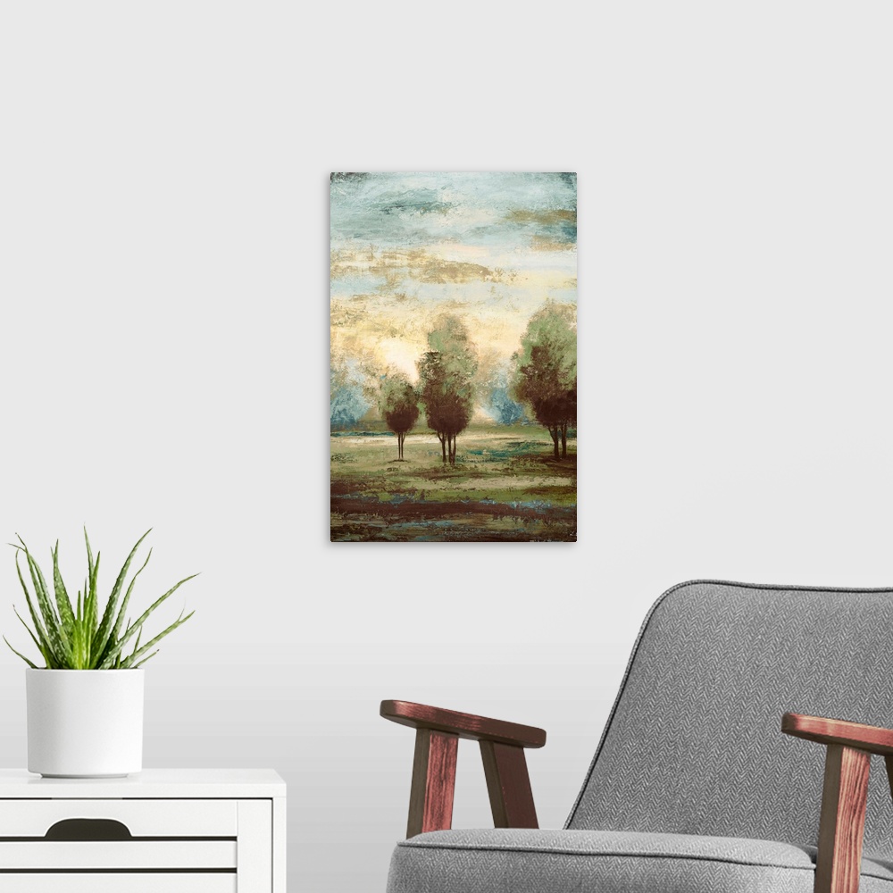 A modern room featuring A vertical landscape painting of trees under a misty sky, this painting is the second half of a d...