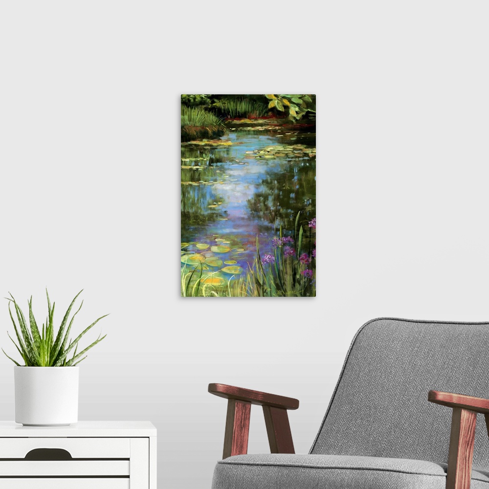 A modern room featuring Big vertical painting of a garden water scene with flowers, water lillies, grasses, trees and oth...