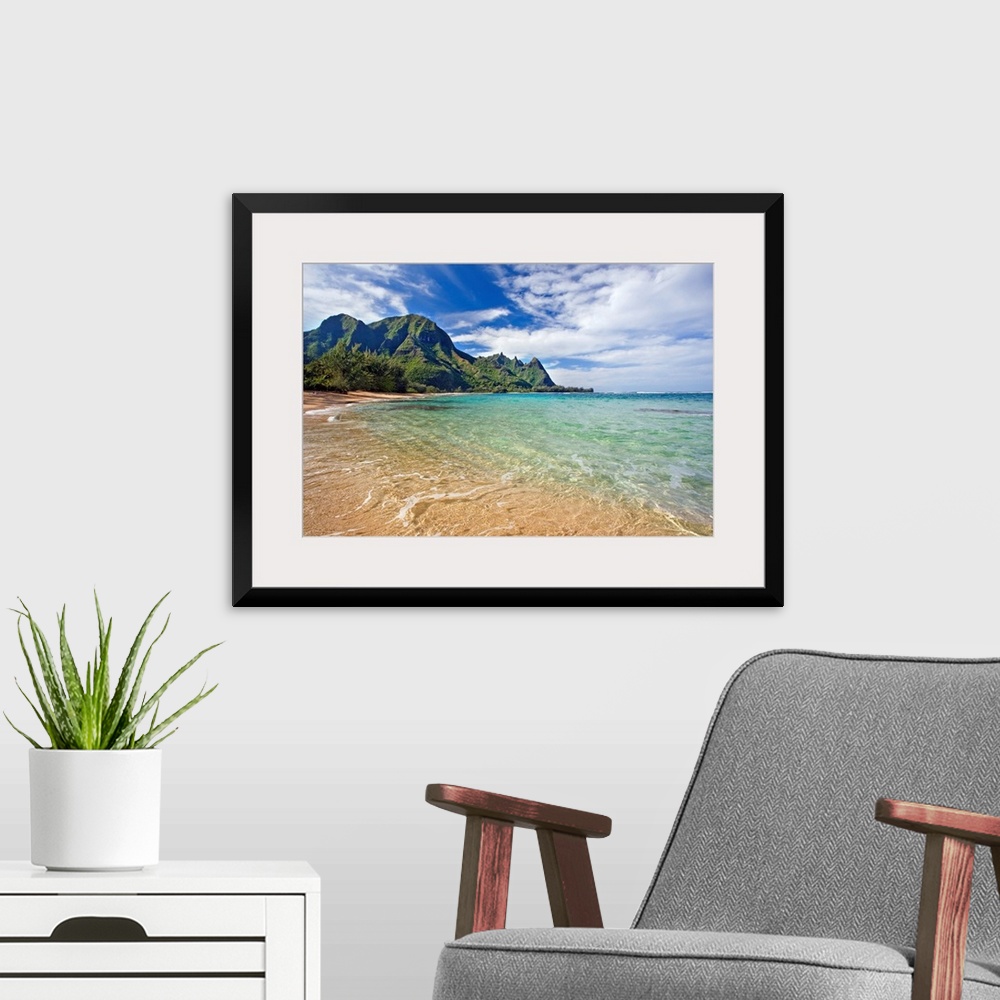 A modern room featuring Docor perfect for the home of office off a coast in Hawaii with an immense mountain straight ahea...