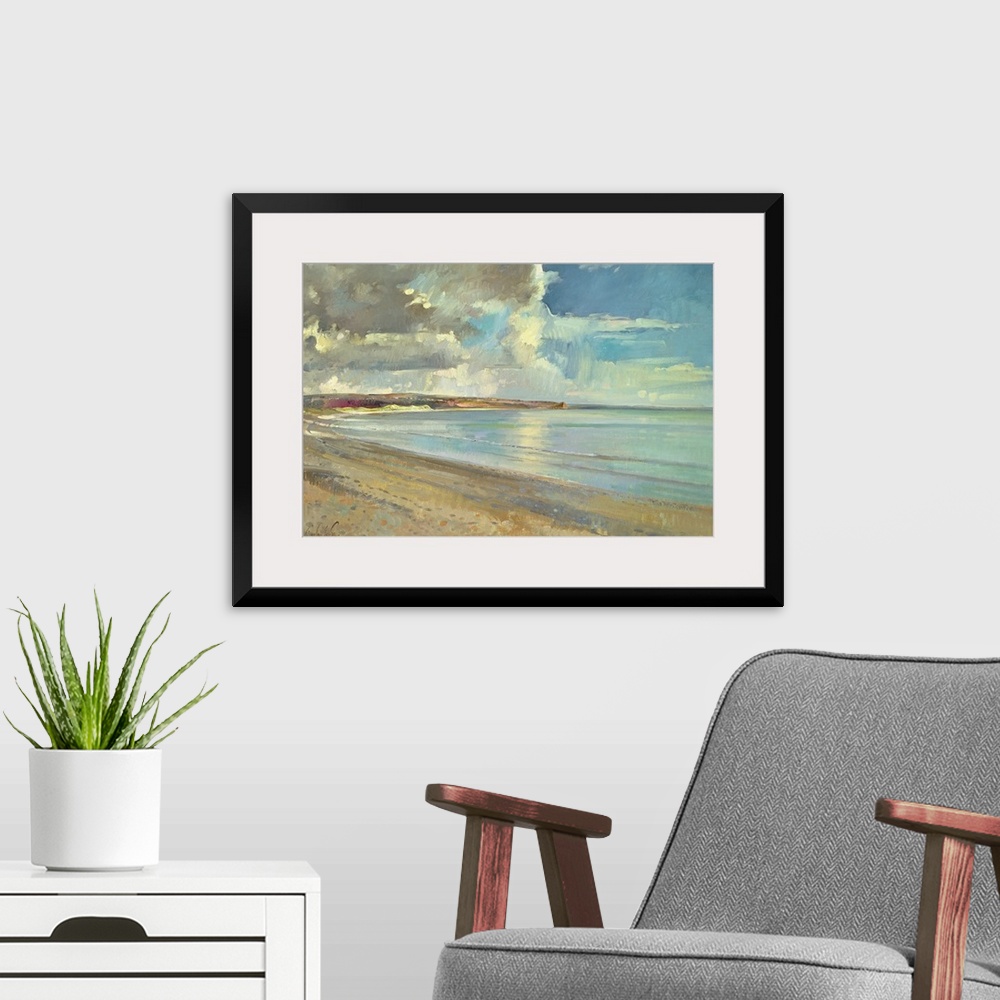 A modern room featuring A contemporary, realistic landscape painting of a sandy beach on a partially cloud day.