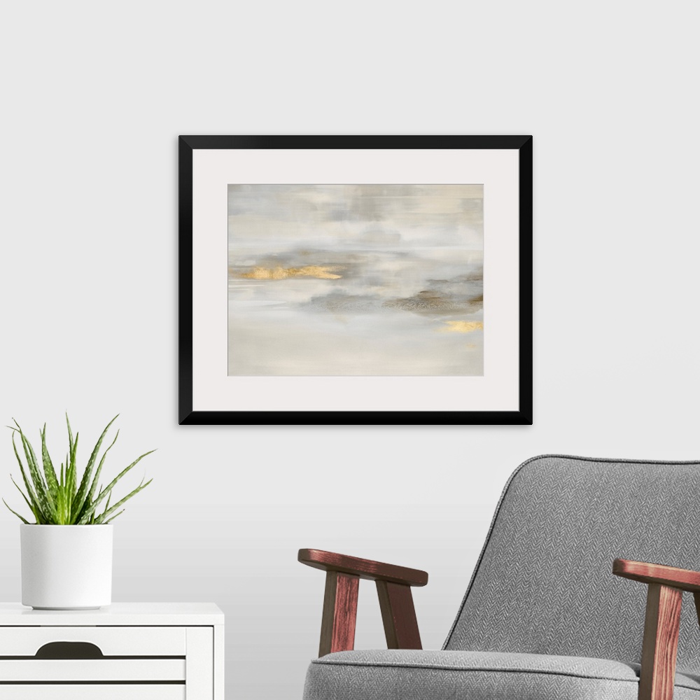 A modern room featuring Contemporary abstract artwork in muted beige and white tones with gold colored brush accents.