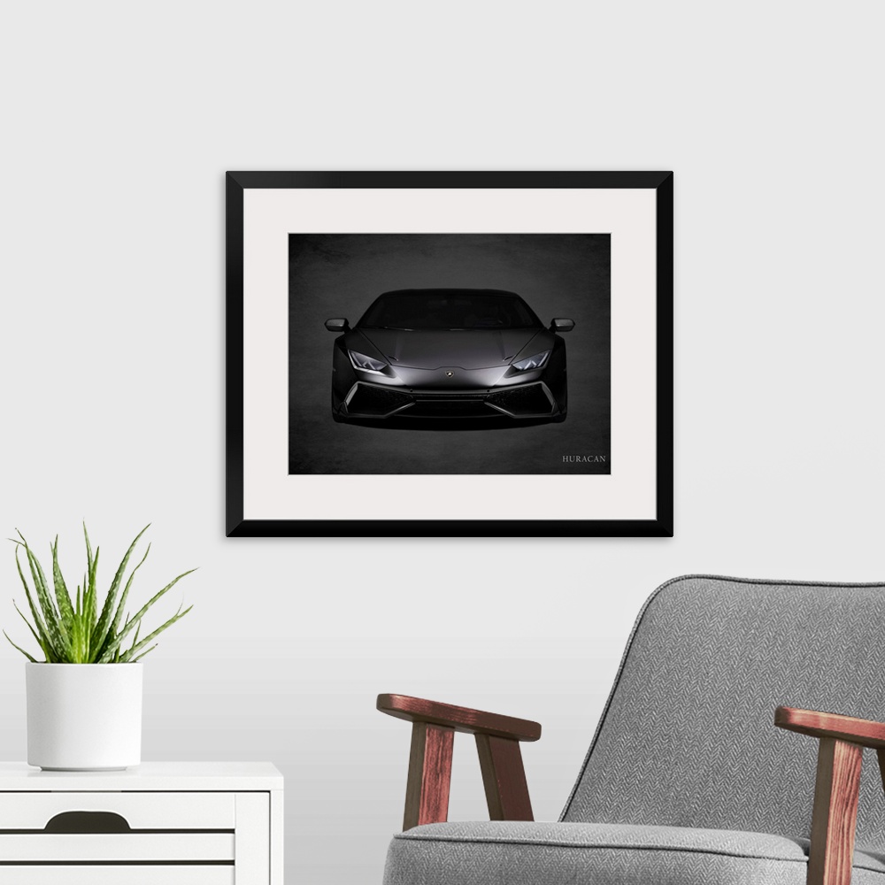 A modern room featuring Photograph of a black Lamborghini Huracan printed on a black background with a dark vignette.