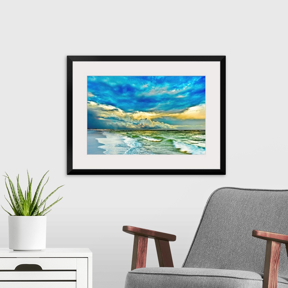 A modern room featuring A blue and turquoise sea with a painted looking sunset. This makes for a beautiful landscape phot...