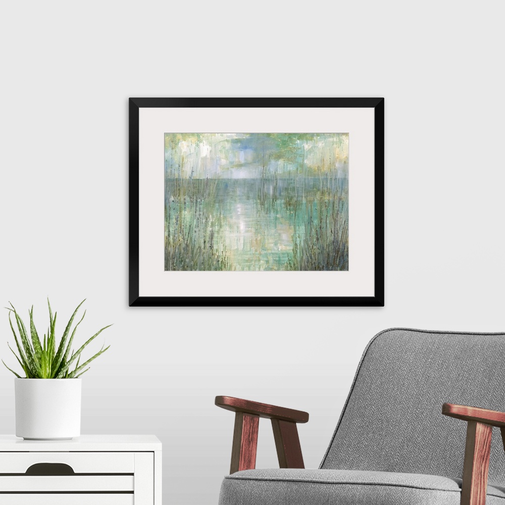 A modern room featuring Abstract landscape painting of the ocean behind tall beach grass in pale green, blue, purple, and...