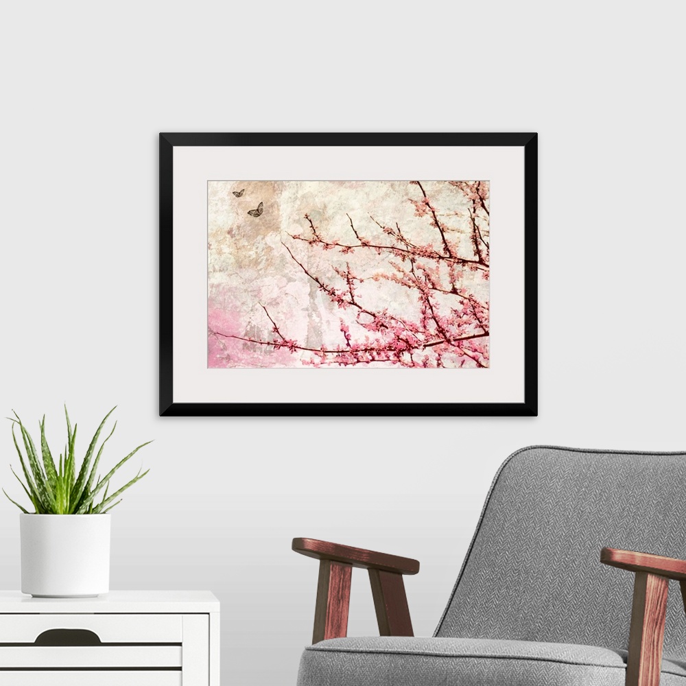 A modern room featuring Contemporary artwork of tree branches covered in flowers with crackled background and two small b...