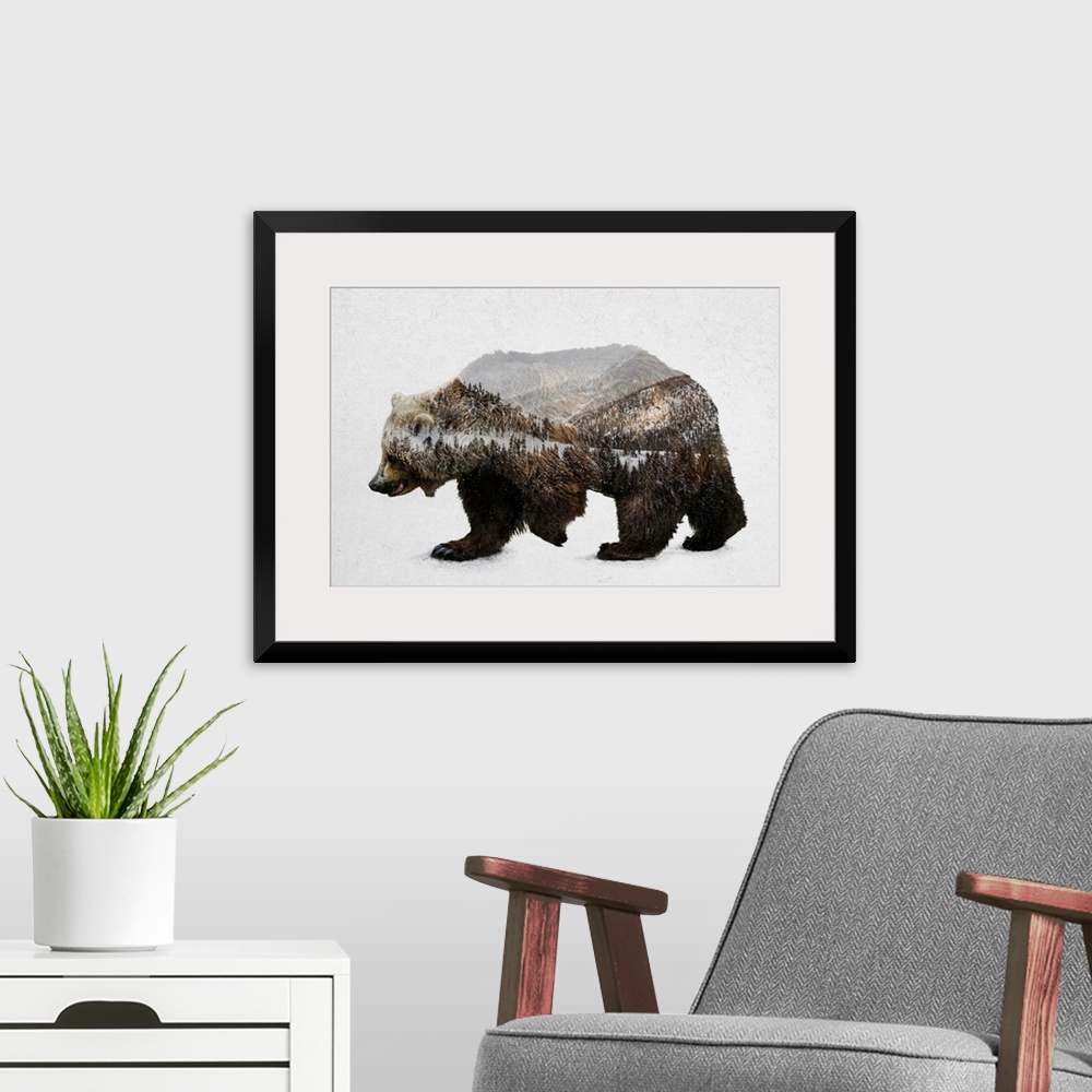 A modern room featuring A contemporary piece of artwork of a wilderness scene withing the outline of a brown bear.