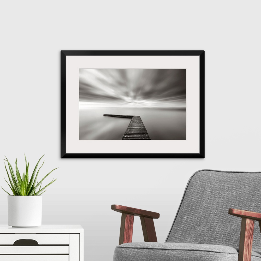 A modern room featuring This wall art is a time lapsed photograph of this lake pier has created a sensation of motion in ...