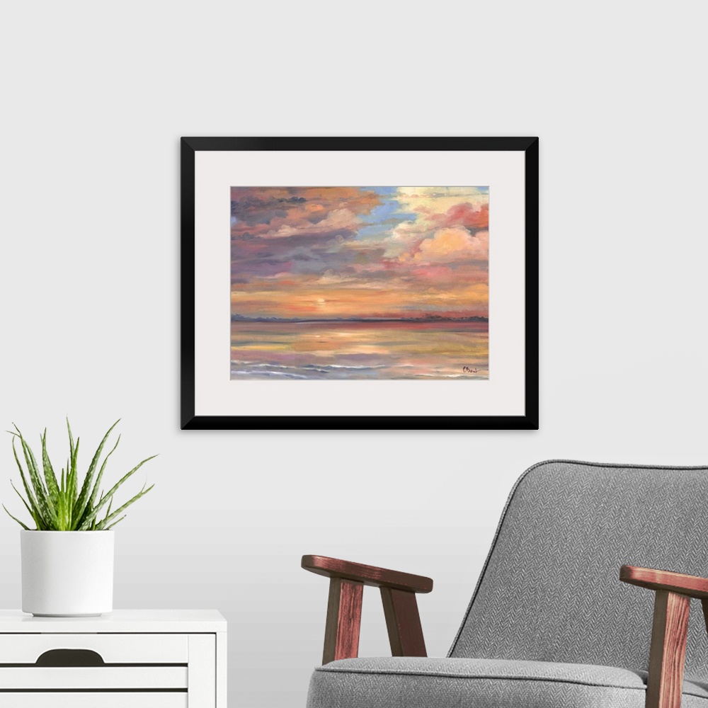 A modern room featuring Contemporary painting of the sunset over the ocean.