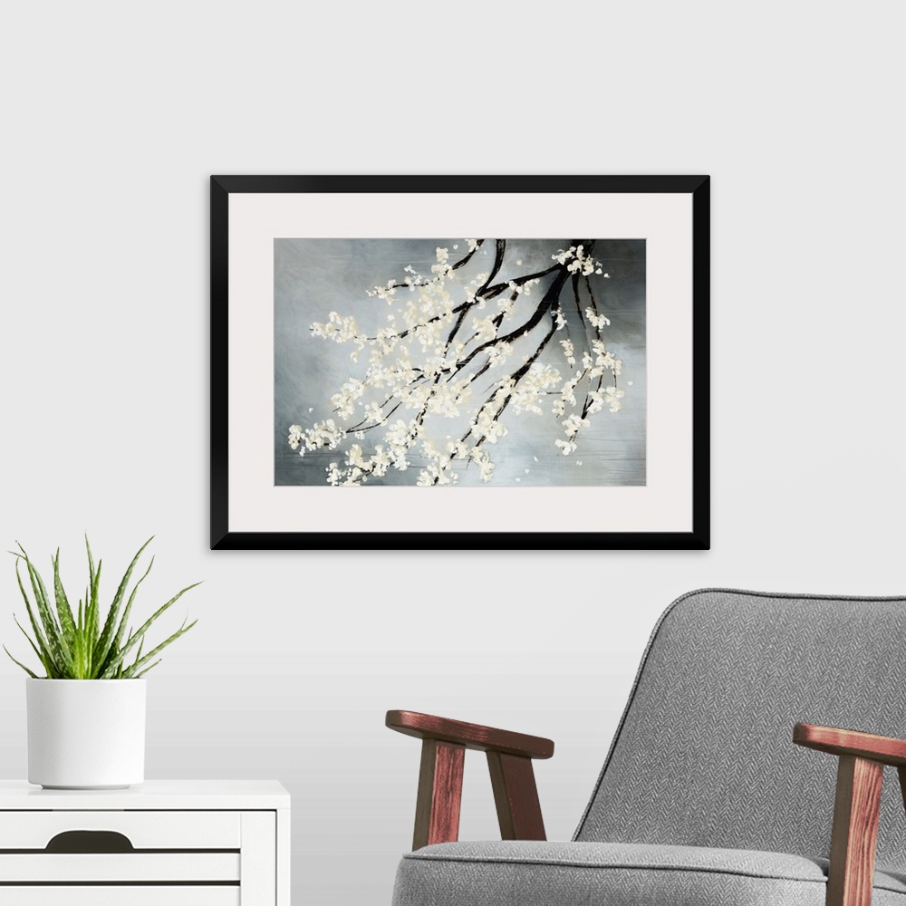 A modern room featuring Contemporary drawing of blooming white flowers on the dark branches of a cherry tree hanging down...