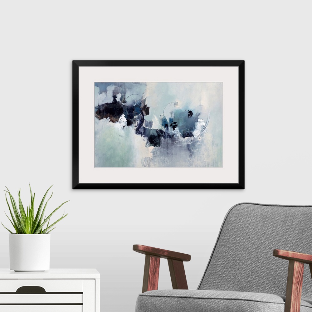 A modern room featuring Abstract painting of a cluster of random shapes and cool neutral tones that appear to breaking th...