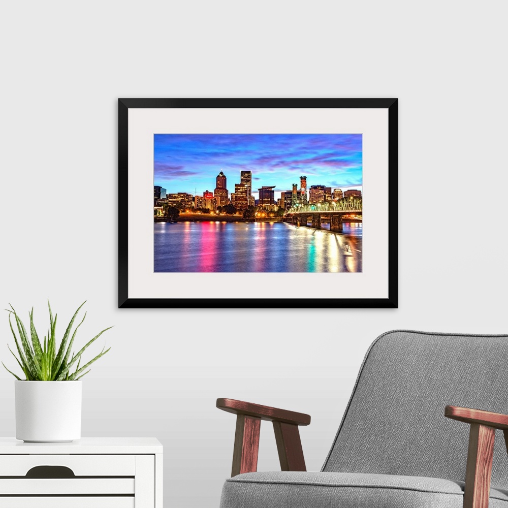 A modern room featuring Photograph of the Portland, Oregon skyline lit up at sunset with colors reflecting onto the Willa...