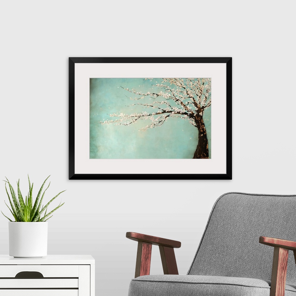 A modern room featuring Painting of a tree full of blooming flowers swaying in the wind against a cool background.
