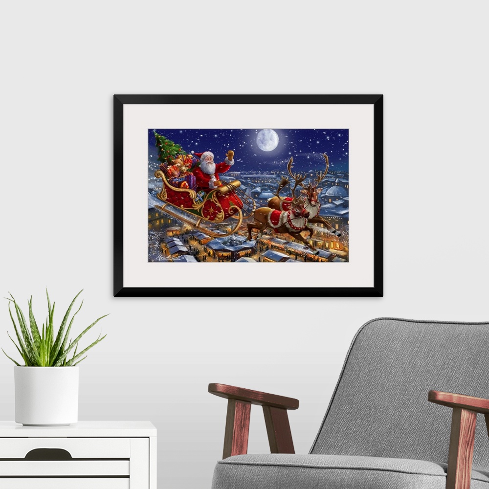 A modern room featuring A traditional image of Santa riding his sleigh of reindeer over a town lit up with lights.