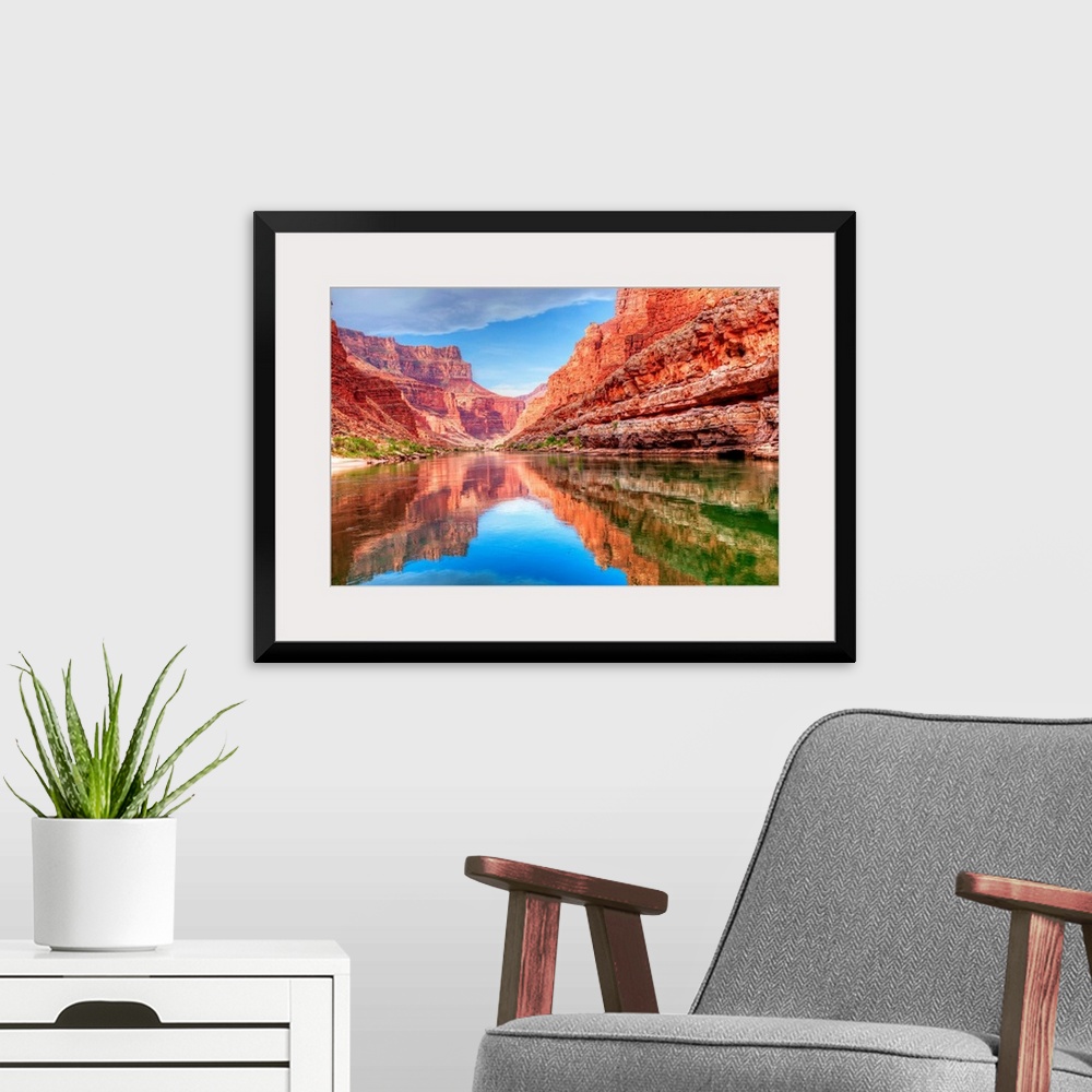 A modern room featuring Reflection of Grand Canyon in Colorado River.