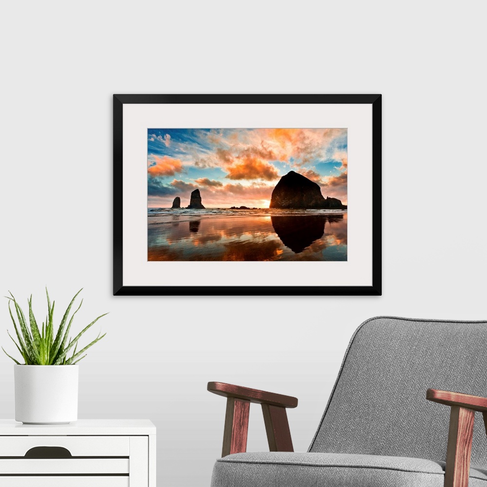 A modern room featuring Haystack Rock at sunset, Cannon Beach, Oregon.