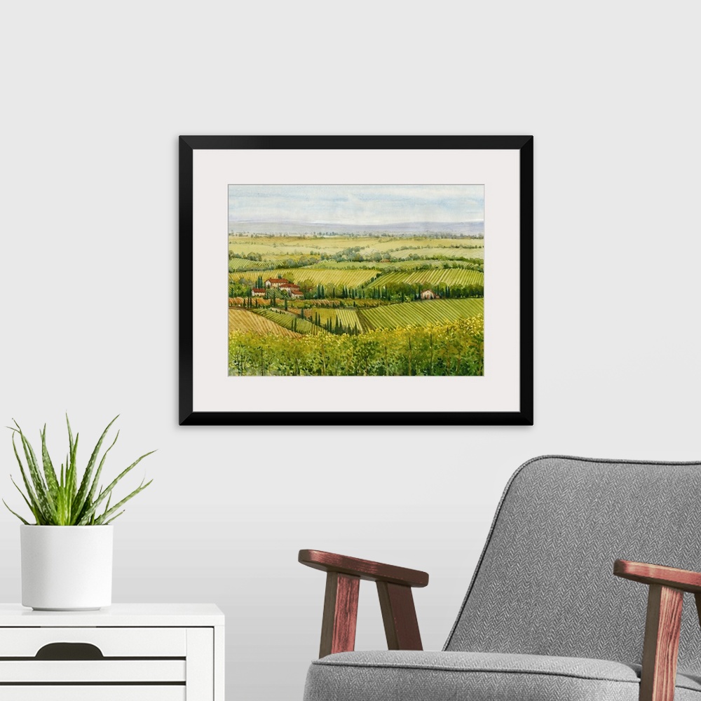 A modern room featuring In this painting, vast ranges of greens and yellows dapple this homely landscape of a Tuscan coun...