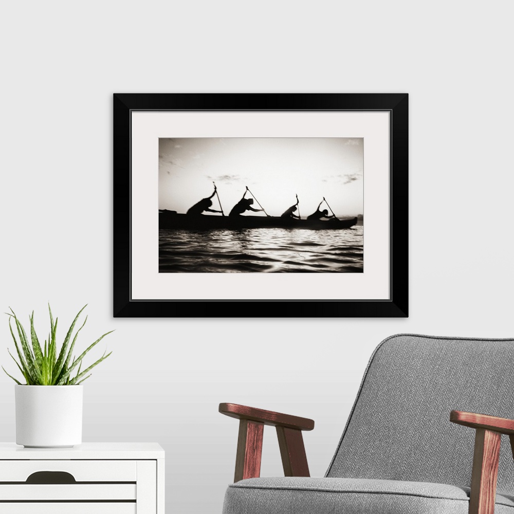A modern room featuring Hawaii, Molokai To Oahu Canoe Race, Paddlers Silhouetted At Sunset (Black And White Photograph).