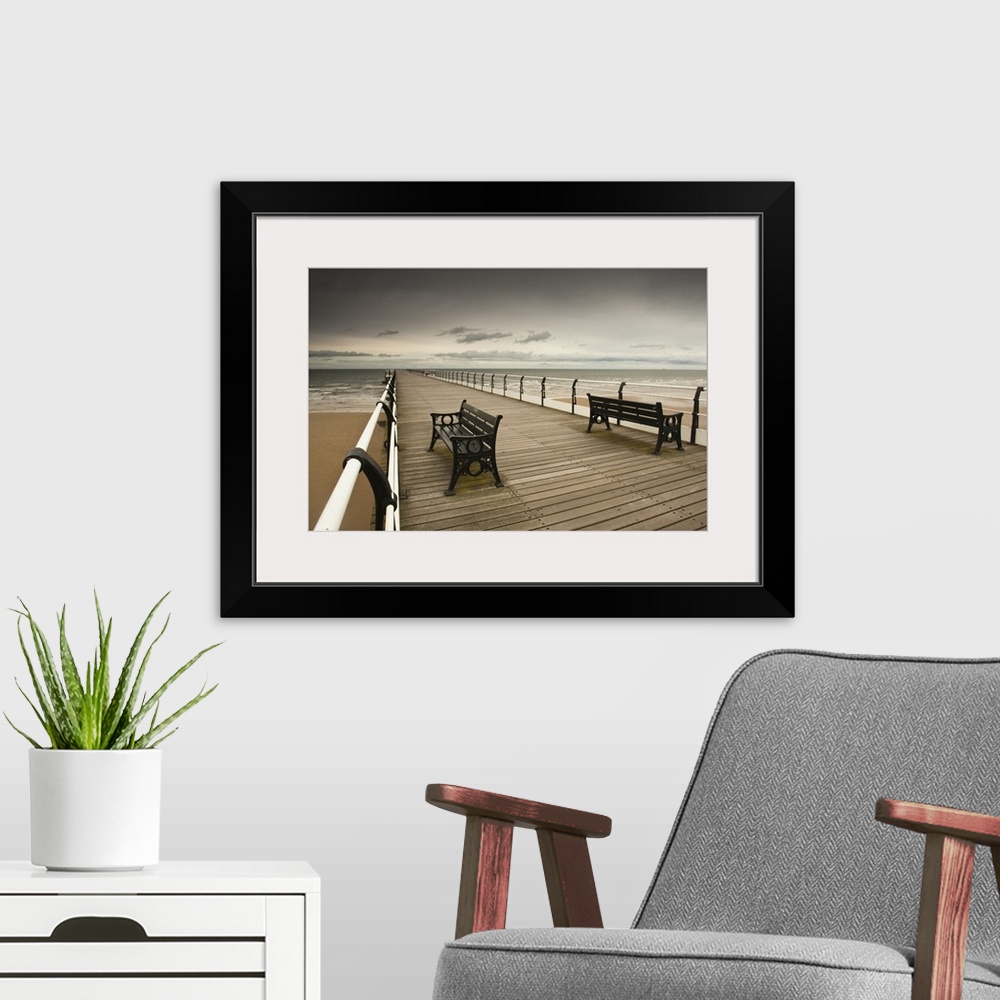A modern room featuring Wooden Pier With Benches; Saltburn, Cleveland, England