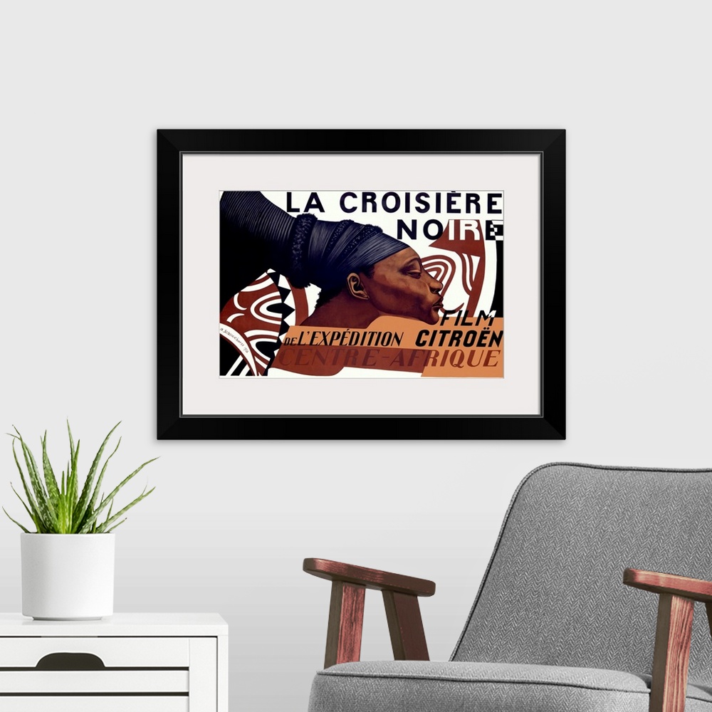 A modern room featuring This large piece is a vintage poster for the La Croisiere Noire with an African woman drawn in th...