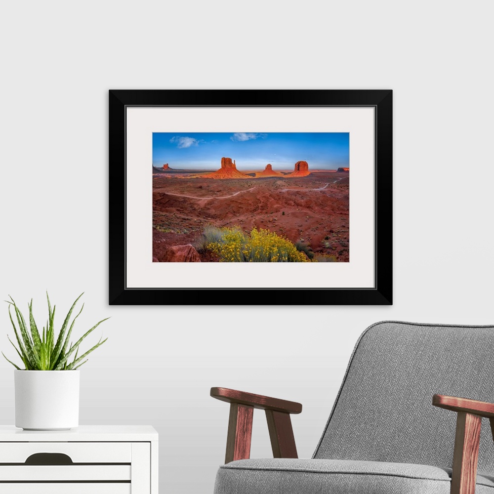 A modern room featuring Monument Valley