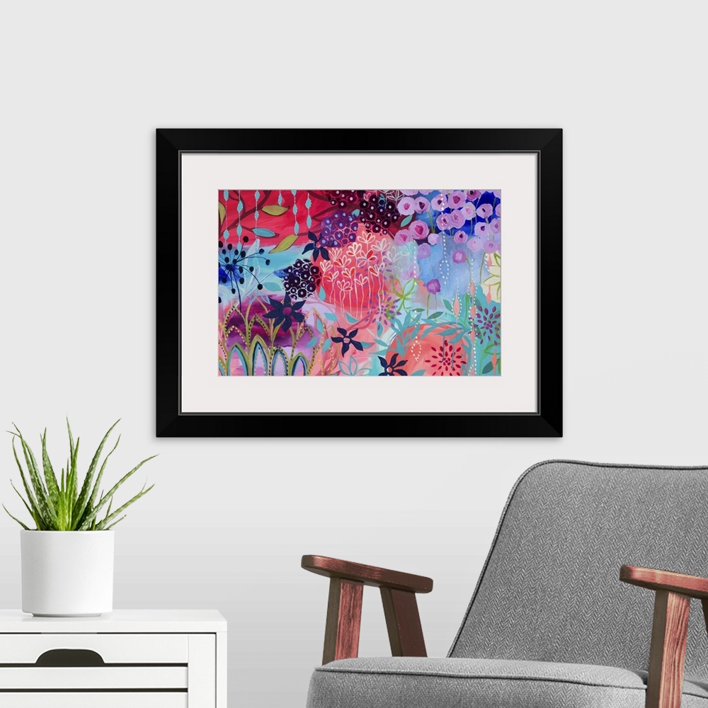 A modern room featuring Contemporary painting of a vibrant wildly colored flowers.
