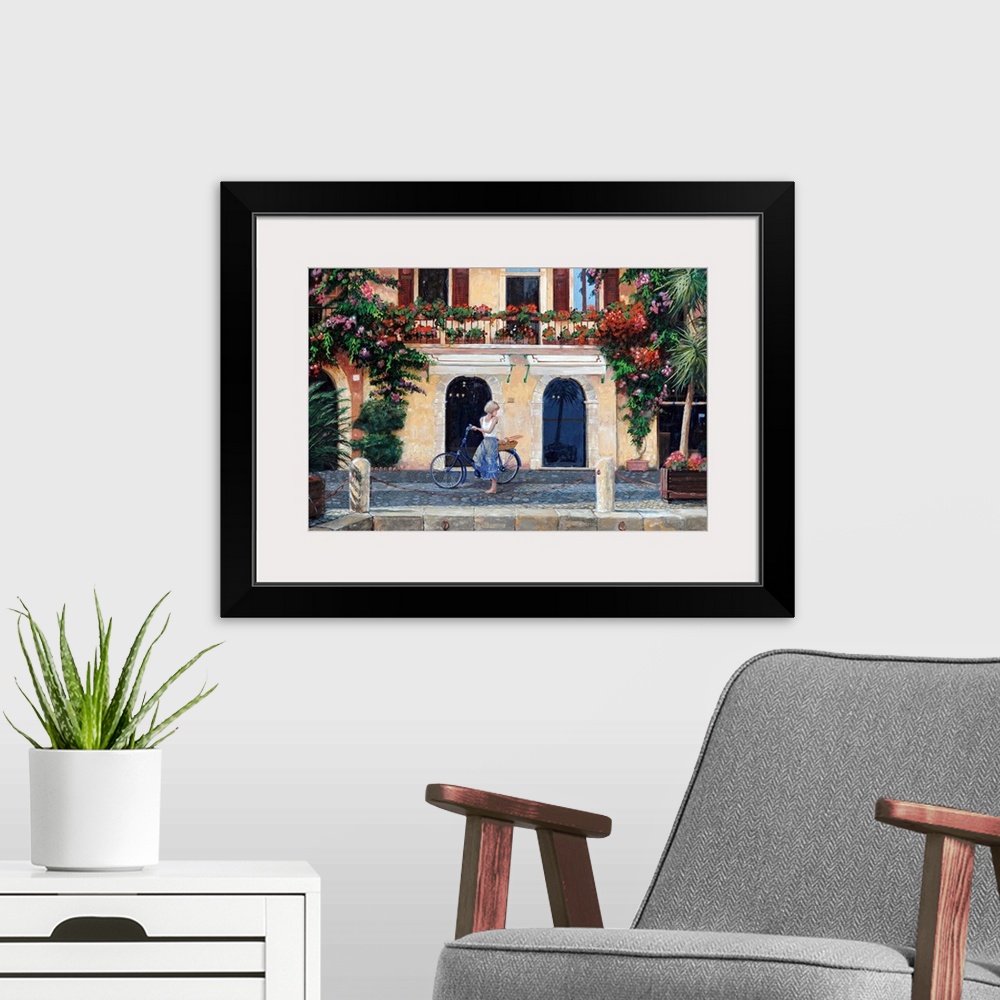 A modern room featuring Big oil painting on canvas of a woman riding a bike through an Italian street.
