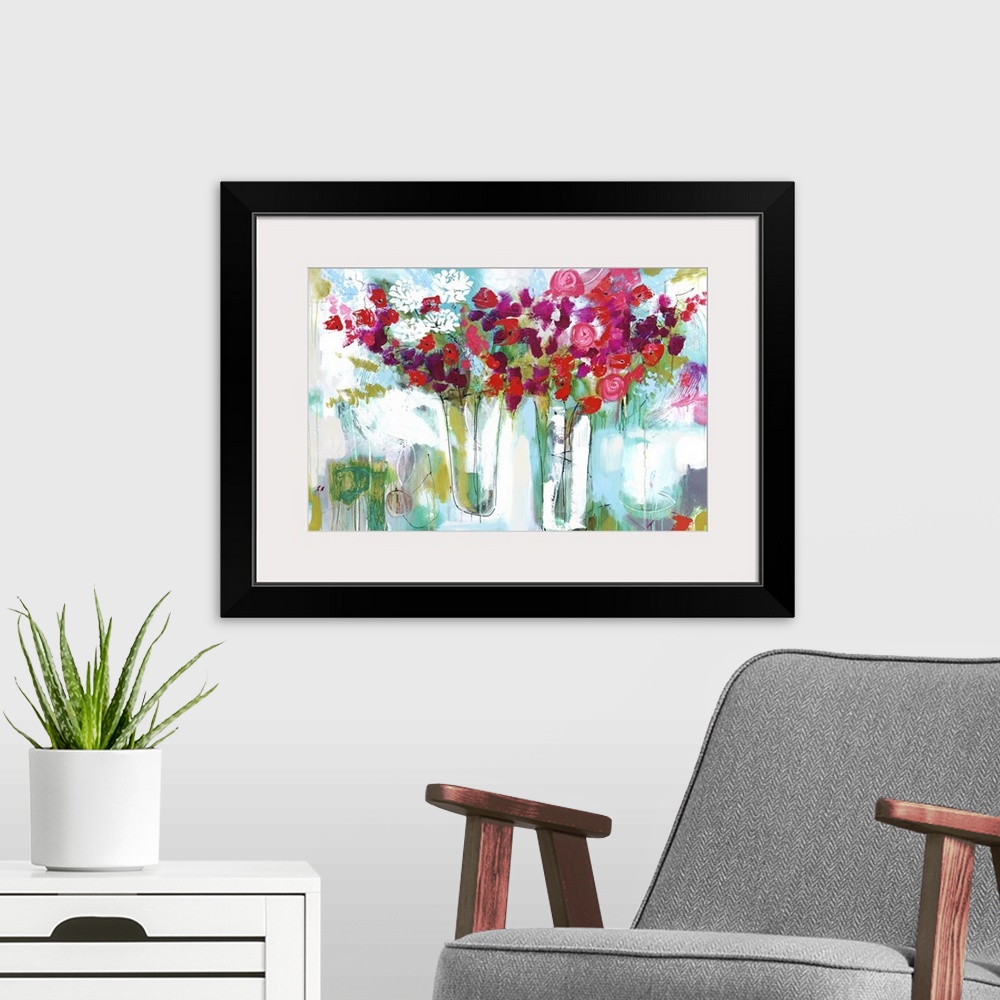 A modern room featuring A horizontal abstract floral painting of red roses and white flowers in two vases on a textured b...