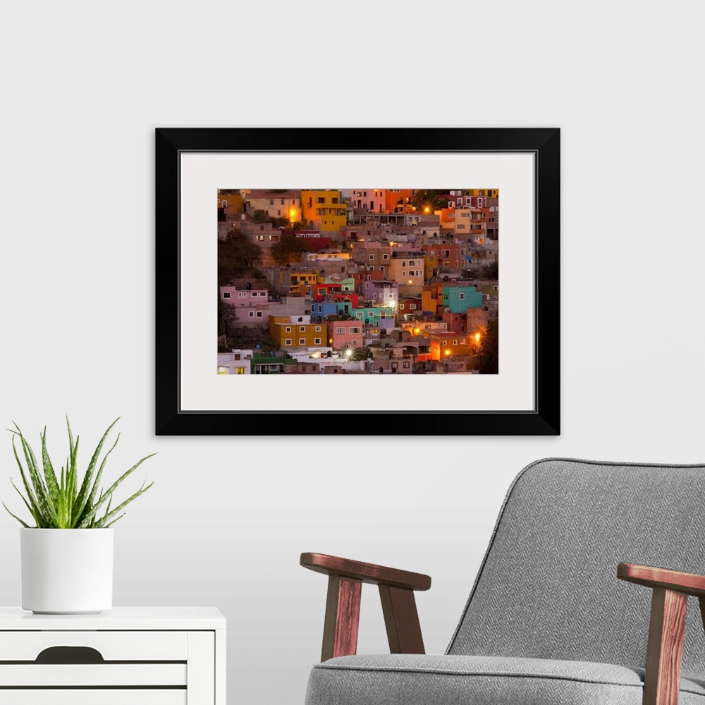A modern room featuring North America, Mexico, Guanajuato. The colorful homes and buidings of Guanajuato at night