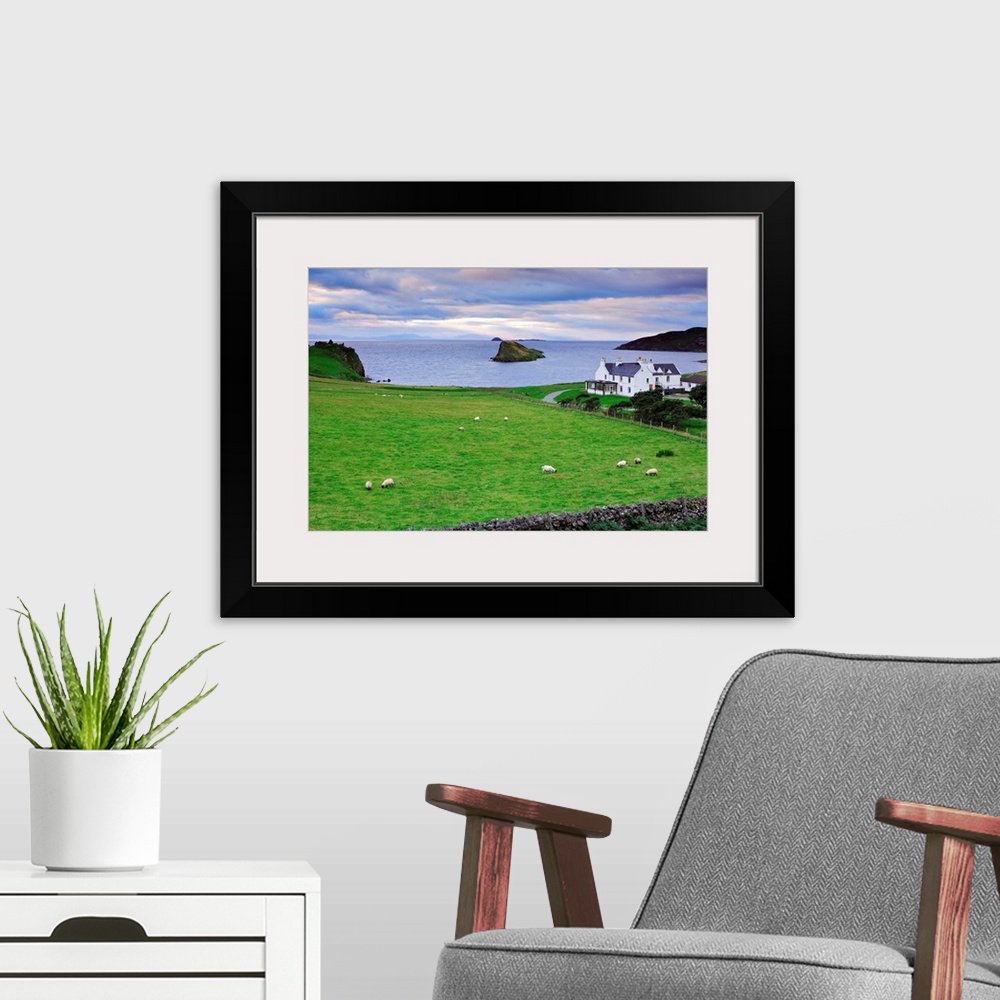 A modern room featuring United Kingdom, UK, Scotland, Highlands, Skye island, View towards Duntulm Castle, Lewis and Harr...