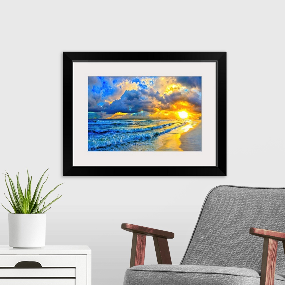 A modern room featuring A beautiful ocean sunset with layered waves and shore in this blue art print.