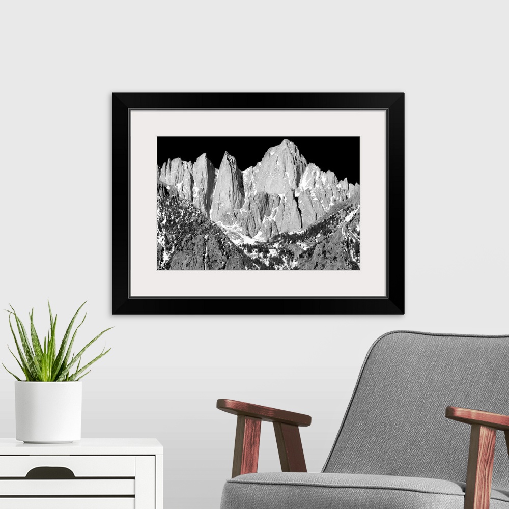 A modern room featuring Black and white photograph of Mount Whitney.