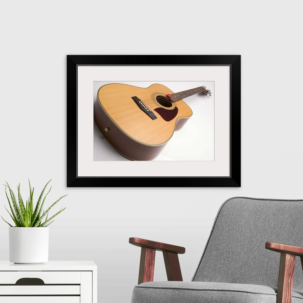 A modern room featuring Acoustic guitar