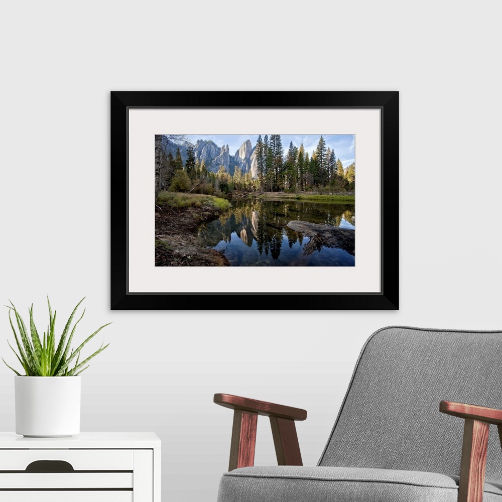 A modern room featuring Reflections of Cathedral Peaks along Merced River in Yosemite National Park.