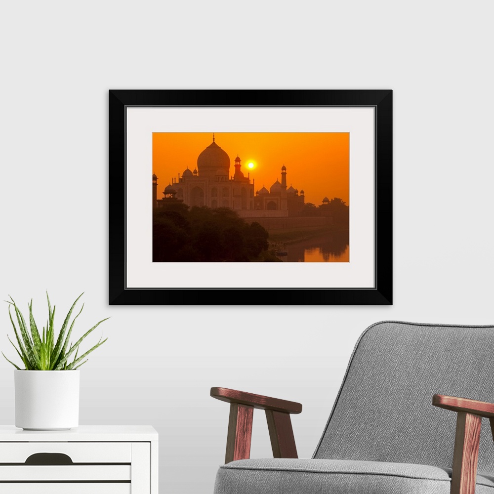 A modern room featuring Sunset at Taj Mahal