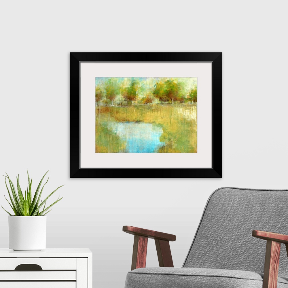 A modern room featuring Large, landscape painting of a small pond surrounded by a green landscape and a line of trees in ...