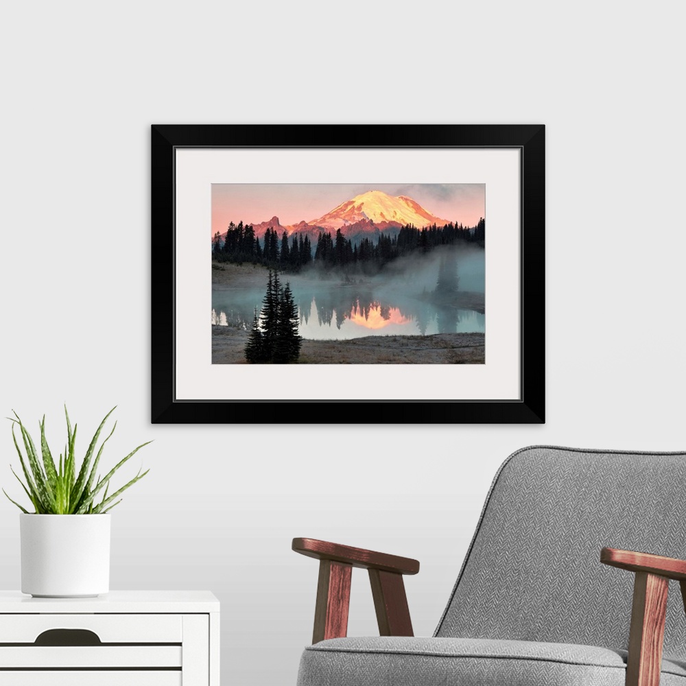 A modern room featuring Fine art photo of sunlight hitting the snow peak of Mount Rainier, Washington.