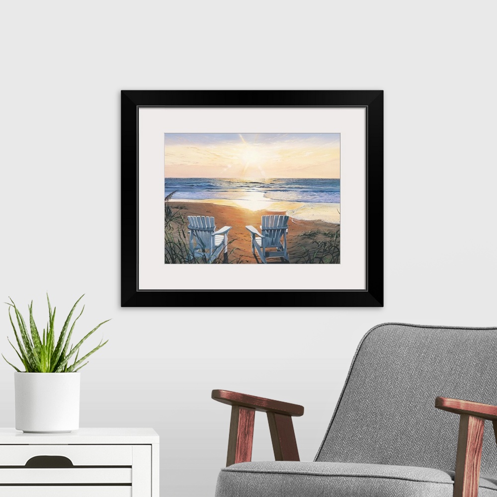 A modern room featuring Painting of two beach chairs on sand near shoreline under a sunny sky.