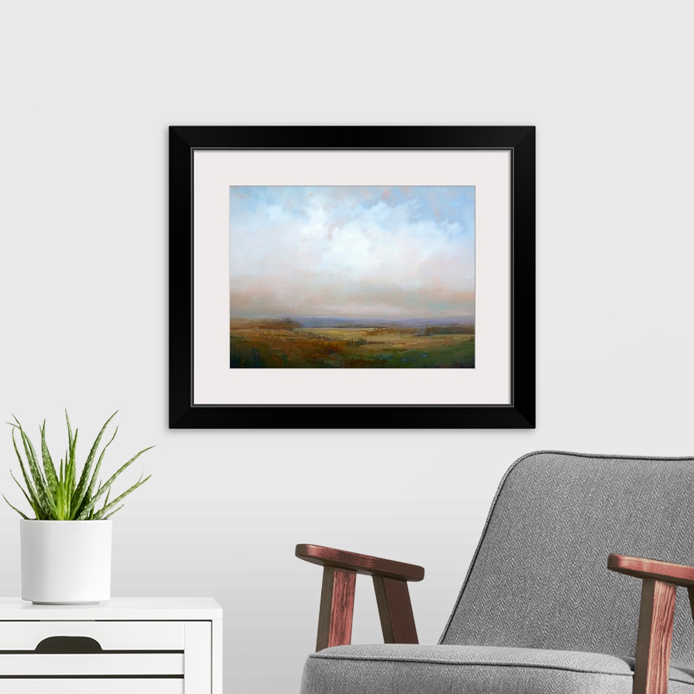 A modern room featuring Contemporary landscape painting with cloudy skies above.