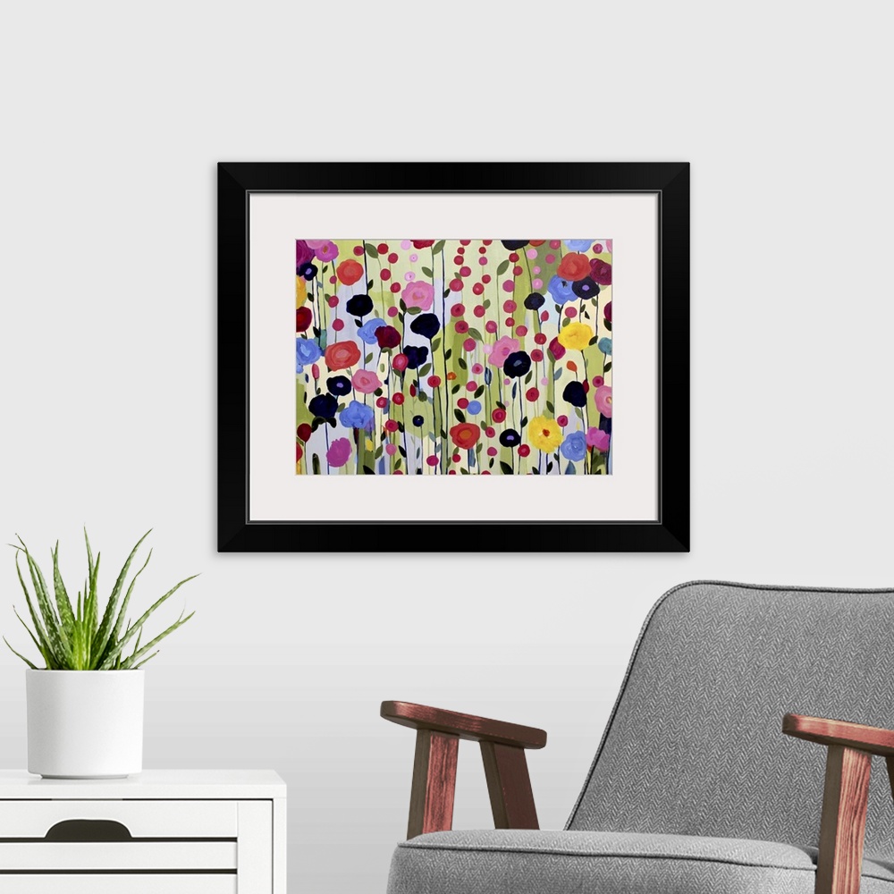 A modern room featuring Colorful painting of a garden of bright flowers.